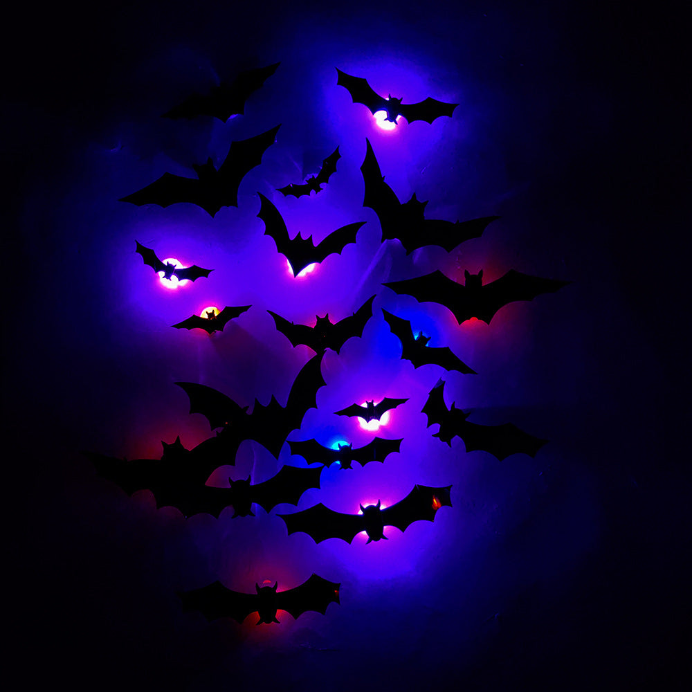 Close-up of a 3D LED bat decal with its light on